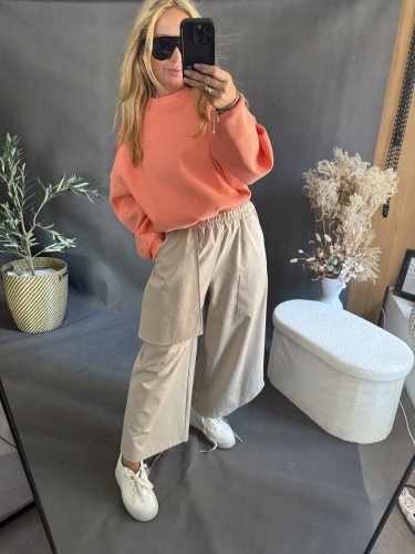 Nohavice s vreckom Sun asymetrický strih-béžové