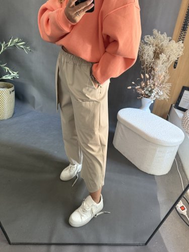 Nohavice s vreckom Sun asymetrický strih-béžové