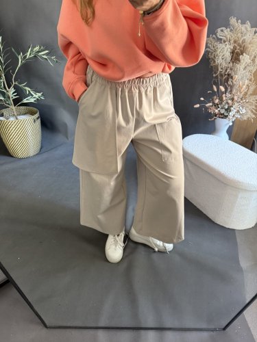 Nohavice s vreckom Sun asymetrický strih-béžové